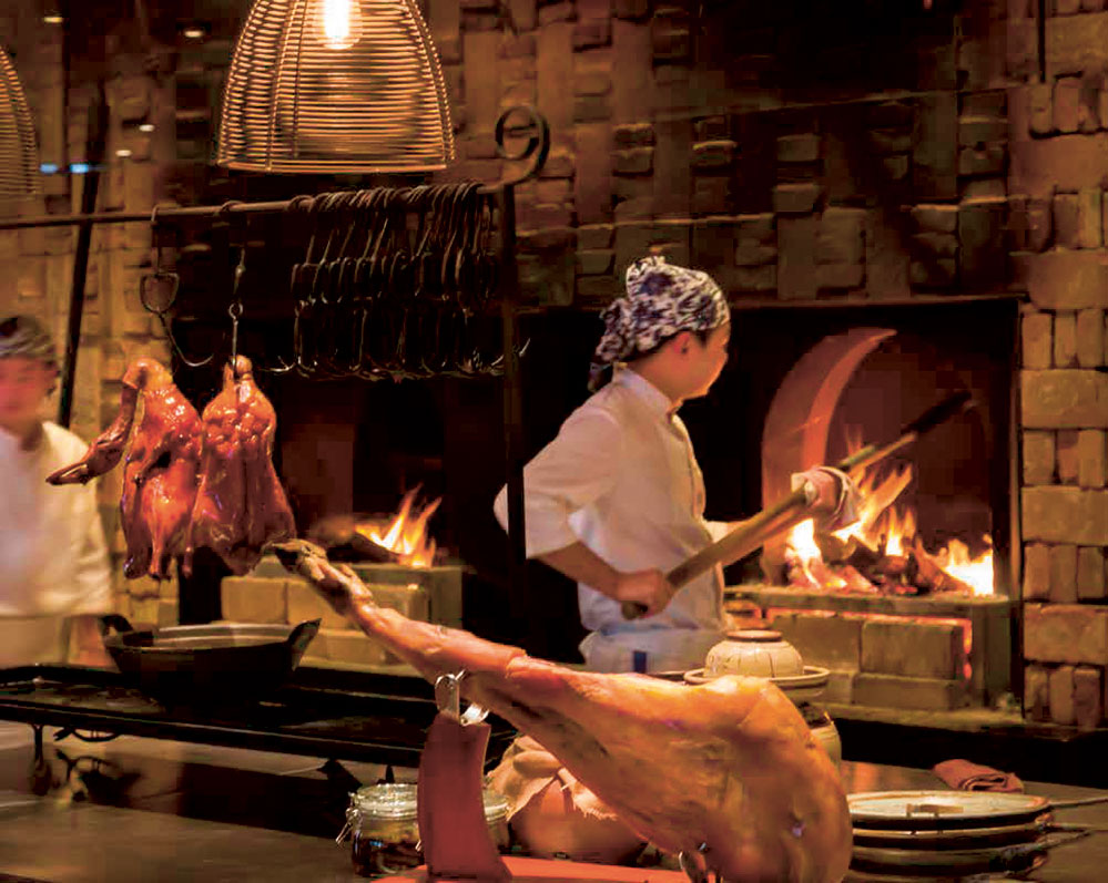 A chef at work at Country Kitchen at Rosewood